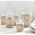 glass water with wicker rattan and handle